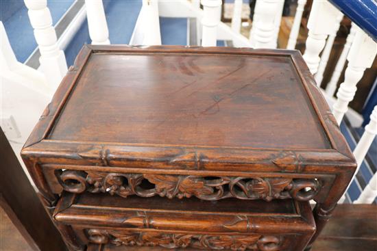 A Chinese nest of four carved hardwood tea tables (the largest a.f.) W.44cm